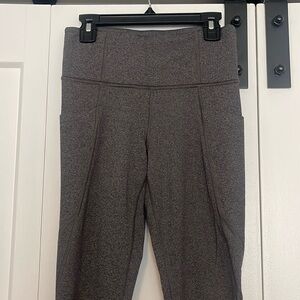 Athleta Stash Pocket Salutation Tight